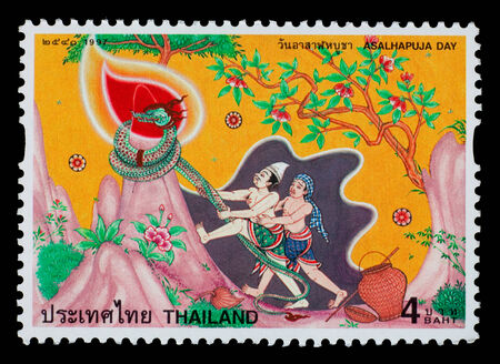 Thailand - Circa 1997: A Thai postage stamp printed in Thailand of a mural depicting traditional Thai cultureのeditorial素材