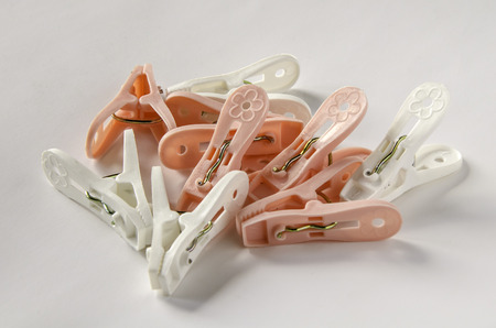 plastic white and pink clothespinの写真素材