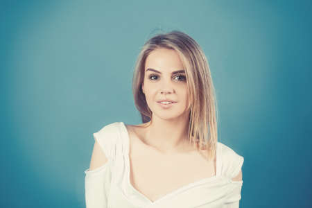 Emotional portrait of Fashion stylish portrait of pretty young hipster blonde woman.の写真素材