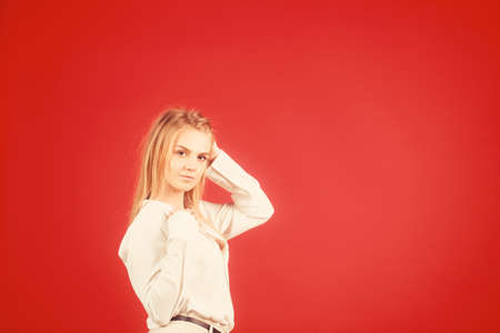 Beautiful sexy business woman dressed in fashion clothes office style, summer or fall collection. Sweety girl smiling with pretty face and makeup, perfect body shape.の写真素材