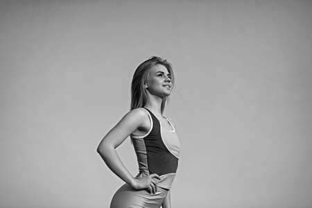 Attractive fitness woman with trained female body. Lifestyle portrait of caucasian model.の写真素材