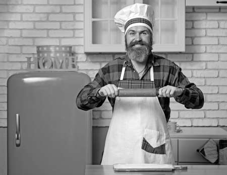 Food concept. Preparing traditional italian pizza in kitchen.の写真素材