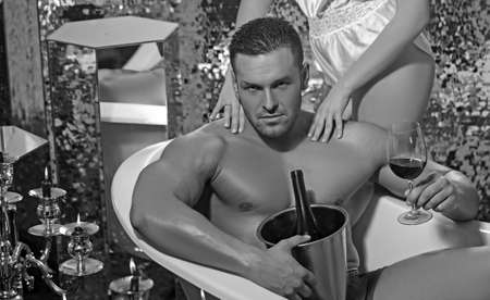 Young happy couple enjoying in the bath - Couple of lovers.の写真素材