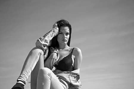 Gorgeous brunette in lingerie posing on the roof.の写真素材