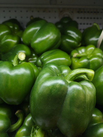 Green bell pepper is fresh, sold in supermarkets.の写真素材