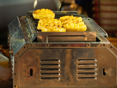 Glutinous rice grilled is a local Thai food sold in the Thai Street Food Marketの写真素材
