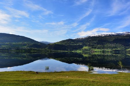 Reflection on a lake in Voss, Norway. Summer.の写真素材