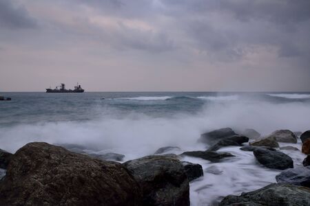 Long exposure rocky seaside scenery in Hualien, Taiwan.の写真素材