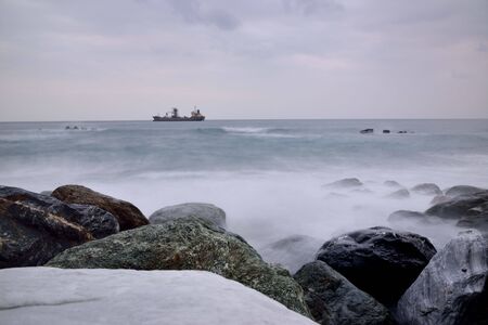 Long exposure rocky seaside scenery in Hualien, Taiwan.の写真素材
