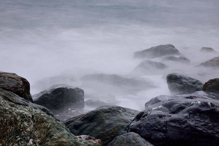 Long exposure rocky seaside scenery in Hualien, Taiwan.の写真素材