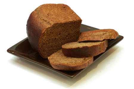   Rye bread on a plate isolated on white background                             の写真素材