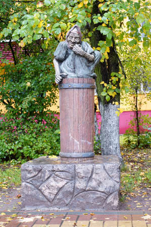 Sculpture fabulous Baba Yaga on a city streetの写真素材