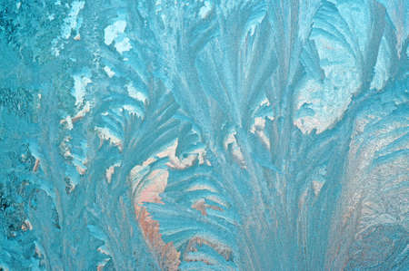 Abstract pattern on a window glass made by frostの写真素材
