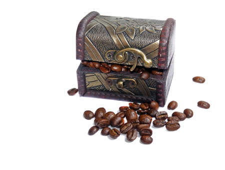 Vintage wooden box with coffee beans isolatedの写真素材