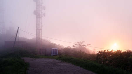 Foggy sunset in the middle of Vladivostok, east coast, Russia, TV tower hillの写真素材