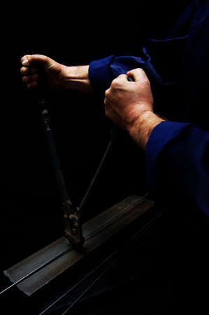 Worker cut metal wireの写真素材