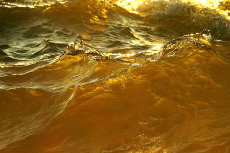 Sunlight in a waveの写真素材