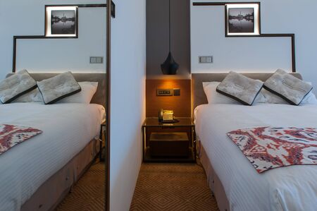 Twin size hotel bedroomの写真素材