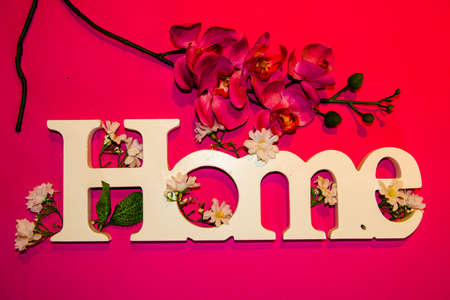 Home sign with flowers