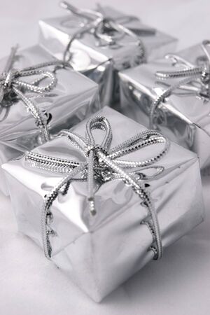 Silver presents with shallow focus on front present of fourの写真素材