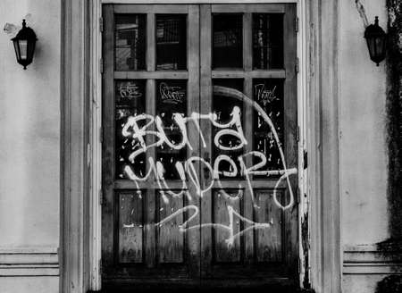 door of abandon house  black and white photoの写真素材