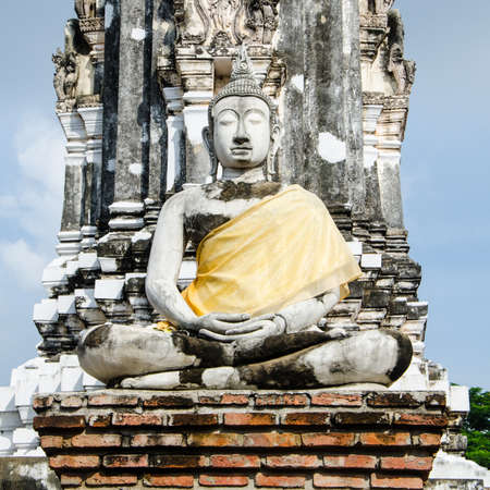 stoned buddha statue in thai templeの写真素材
