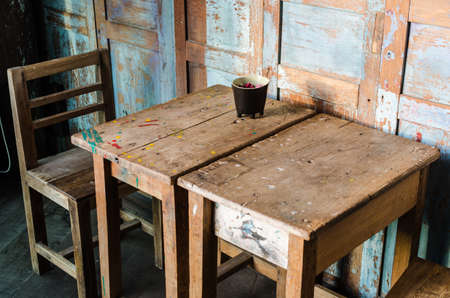 vintage style chair and table in the cafeの写真素材