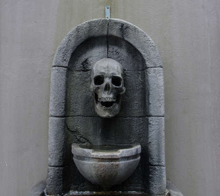 old creepy skull fountainの写真素材