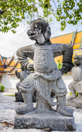 stoned Hanuman statue in Wat Suthat Thepwararam, Bangkokの写真素材