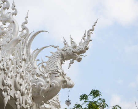 dragon chinese zodiac at white temple, Wat Rong Khun, Chiang Rai, Thailandの写真素材