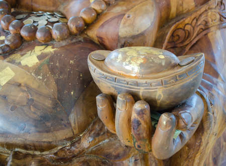 hand of Katyayana holding gold nuggetの写真素材