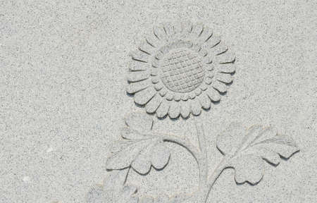 sunflower sculpture stone wall artの写真素材