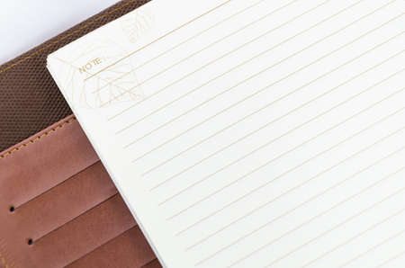 brown notebook with blank brown page