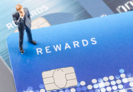 miniature business man on the credit card,online shoping conceptの写真素材