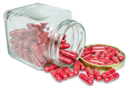 Isolated dusted expried old red capsule pills