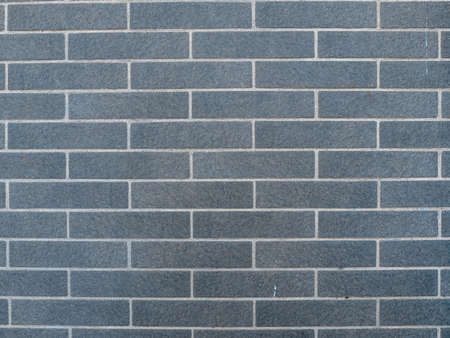 Gray brick texture close up, wall seamless pattern.の写真素材