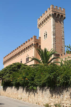 Bolgheri Castle, Tuscany, Italy, against a blue skyのeditorial素材