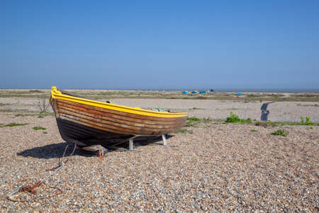 Fishing boat on Kessingland Beach in Suffolk, Englandの写真素材