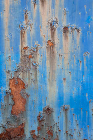Rust and peeling blue paintの写真素材