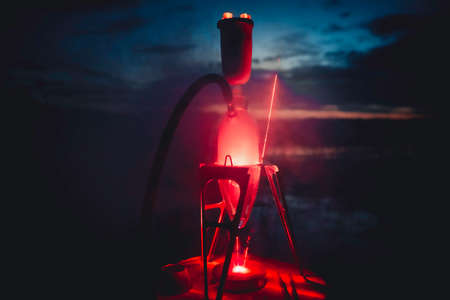 Night hookah on the nature. Near the tent camping on the lake.のeditorial素材
