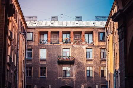 Beautiful Old Mansion With Stucco Molding Balcony in Saint-Petersburg, Russia. Stucco molding on the top part of a facade.のeditorial素材