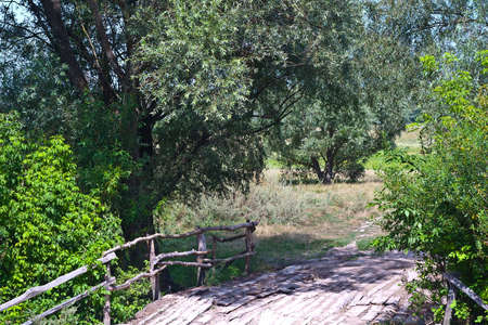 A beautiful, ancient, wooden bridge - a great background.の写真素材