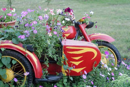 Motorcycle gardener is ready for earth works.の写真素材