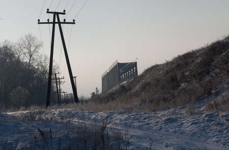 Winter landscape with a railway bridge is a good screensaver.の写真素材
