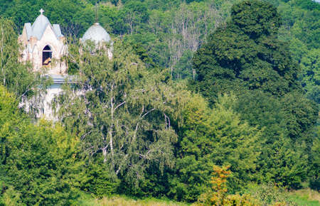 The church on the mountain is a beautiful summer landscape.の写真素材