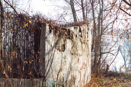 Old dilapidated fence in the fall.の写真素材