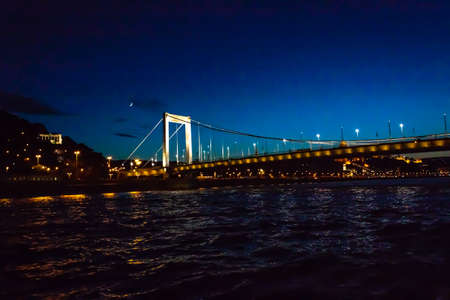 Erzhebet Bridge in Budapest over the Danube River at night.の写真素材