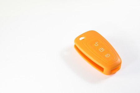 orange silicone rubber key cover on white backgroundの写真素材