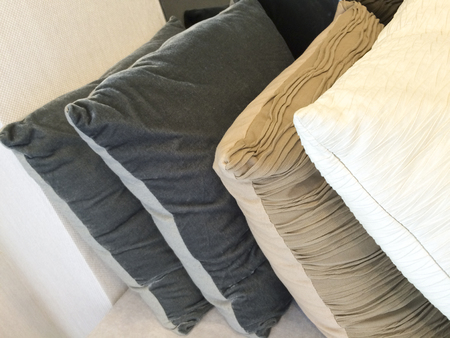 Close up detail of  pillow on sofa in a home