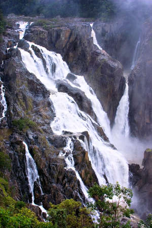 Mist rising from the thundering Barron Falls after heavy rains.